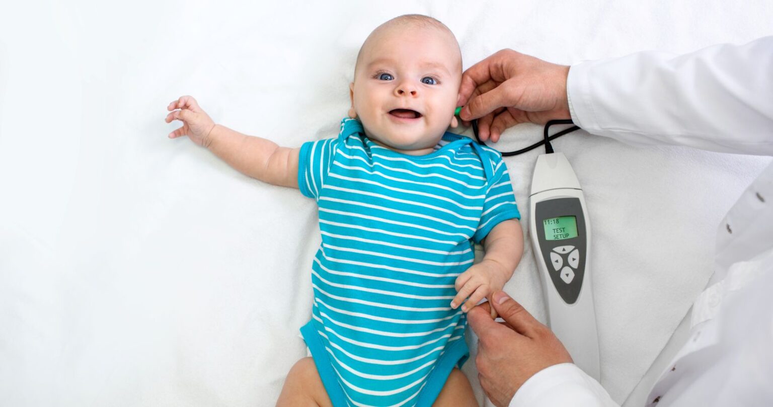 baby being screened for hearing loss